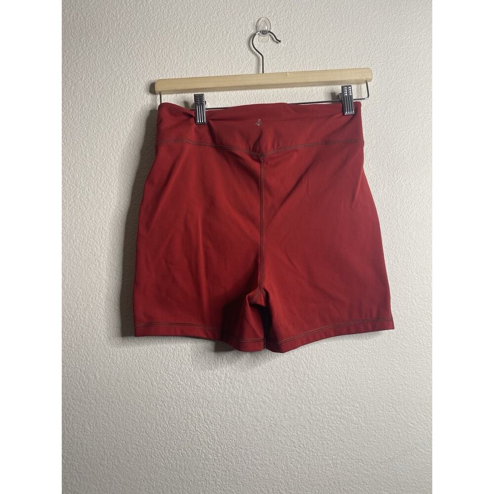 Free People Movement Wave Rider Shorts in the color Brick Merlot Red Medium - Picture 3 of 5